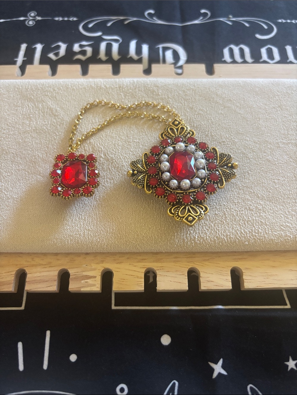 Gold-Tone Necklace with Red Gemstone Pendant